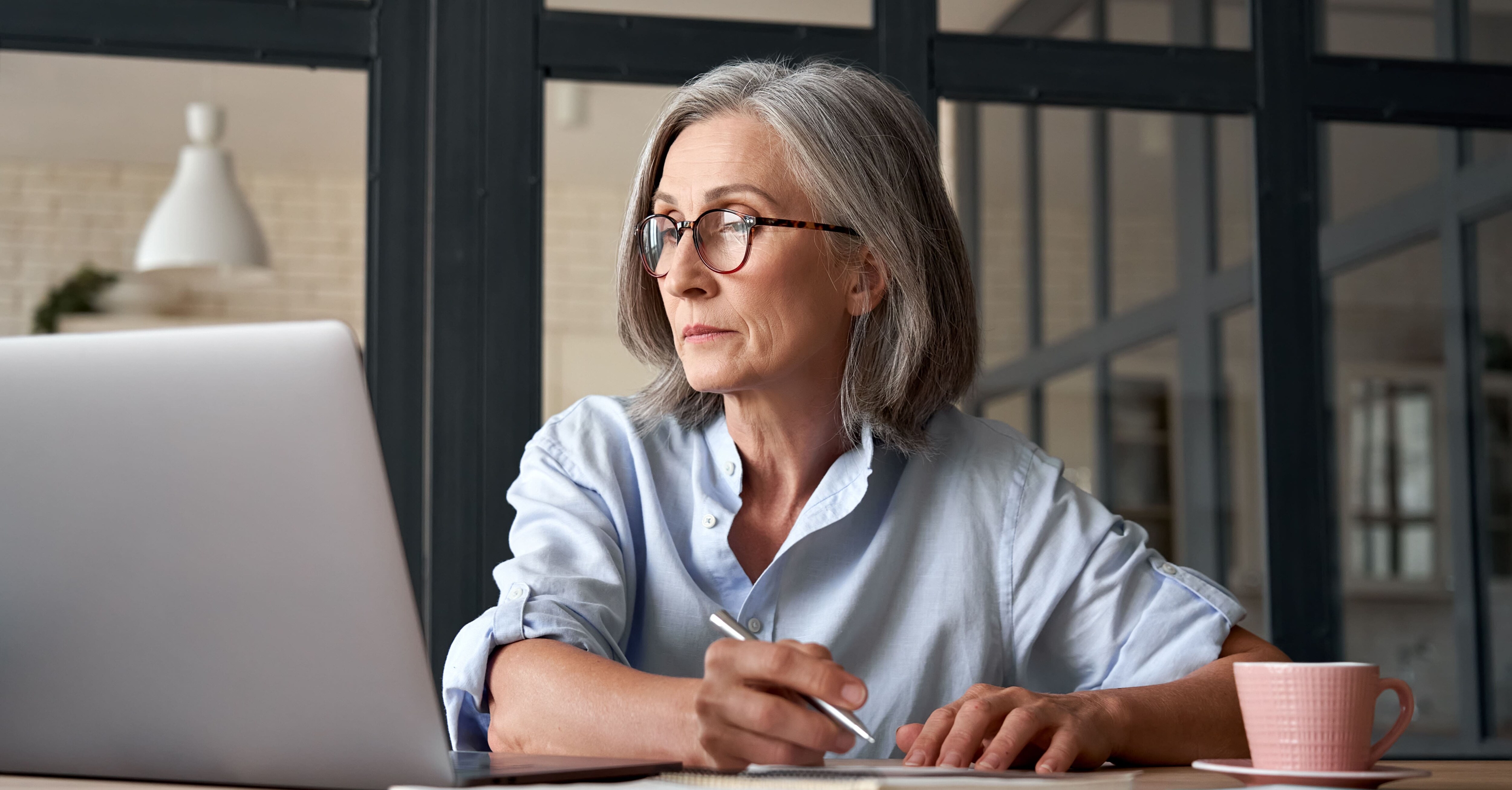 Woman looking at computer screen