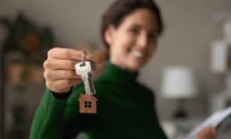 Real estate agent holding keys