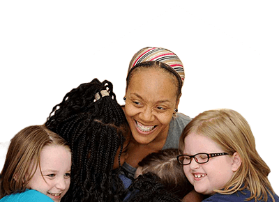 Children hugging women