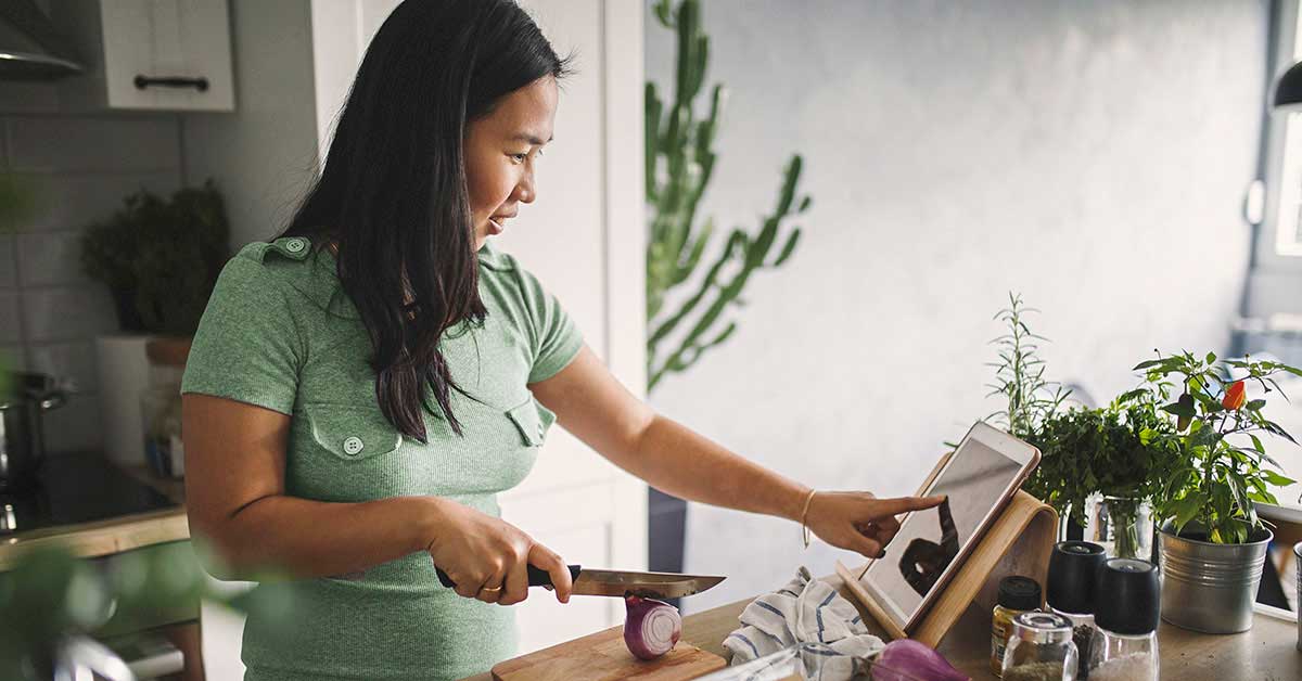 A woman automating her savings with Money Scout℠