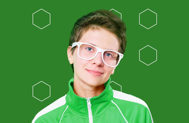 person smiling with white glasses