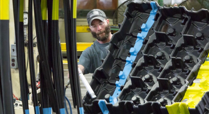A man at work at Vantage Plastics.