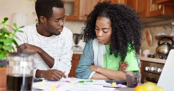 Couple budgeting finances