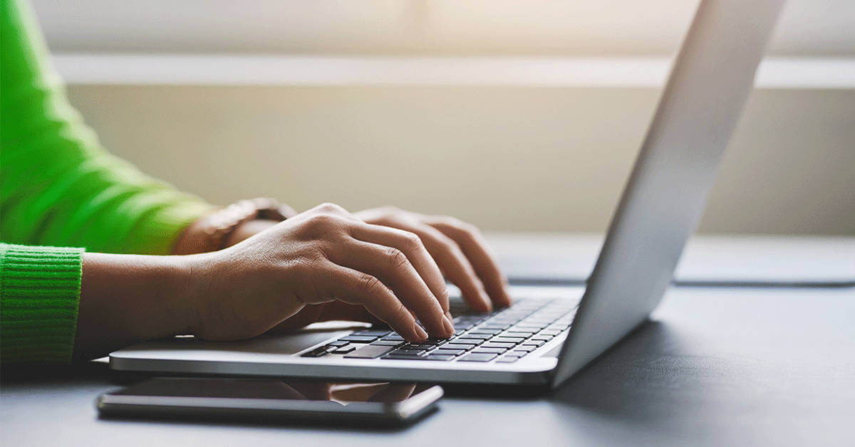A woman on the computer trying to order checks online.