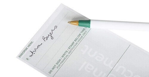 a signature on the back of a check