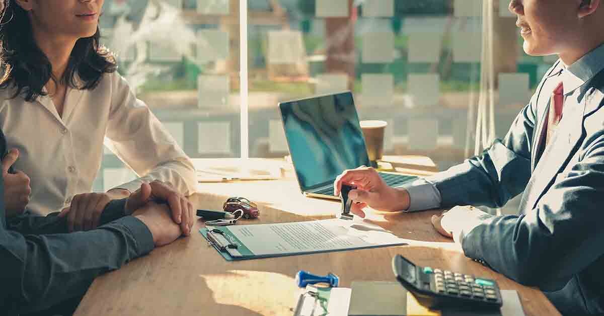 a couple chats with a banker about getting a loan with no credit