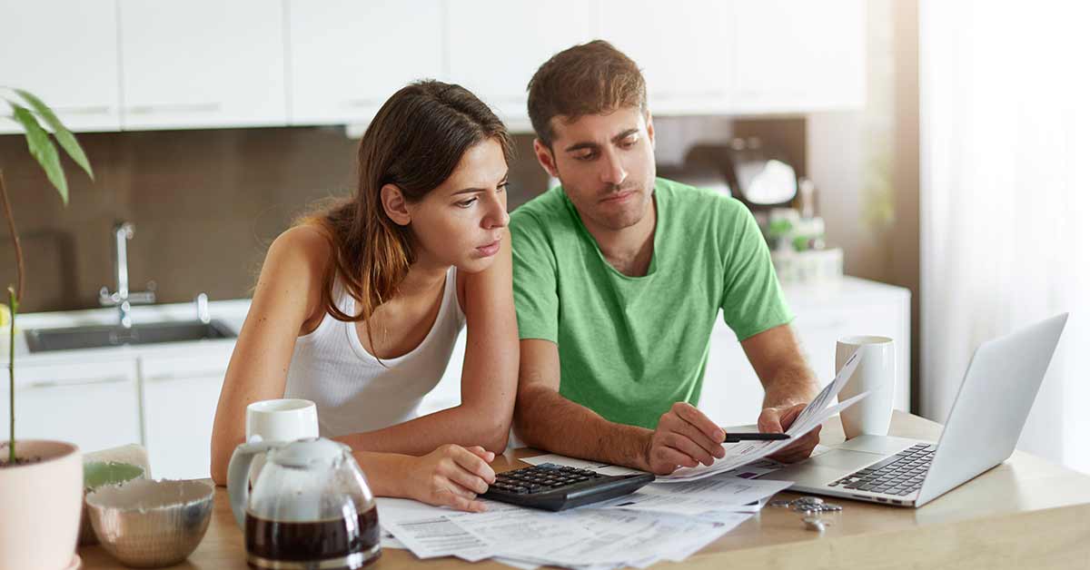couple looking over budget