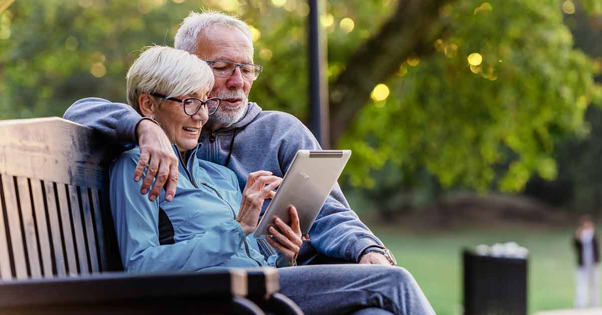older couple looking at tablet together