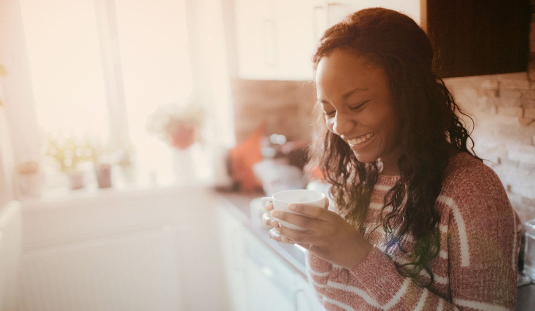 Lady enjoying a cup of coffee