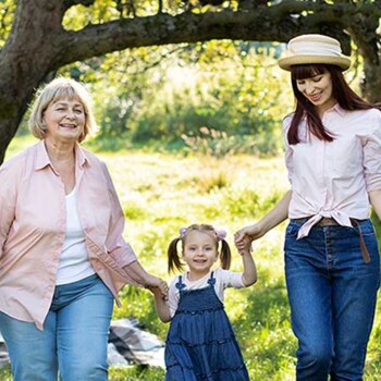 family walking through the park