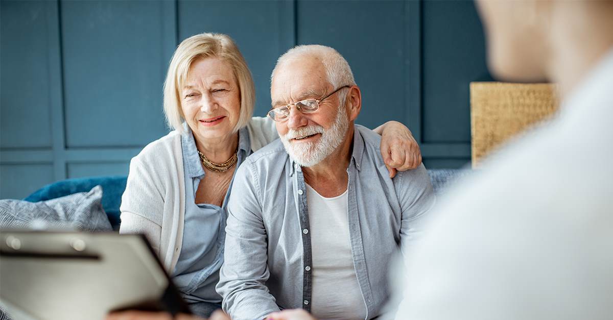 Man and woman looking at computer screen